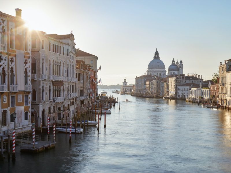 Grand Canal in Venice with Saint Mary of Health basilica, sun in Italy